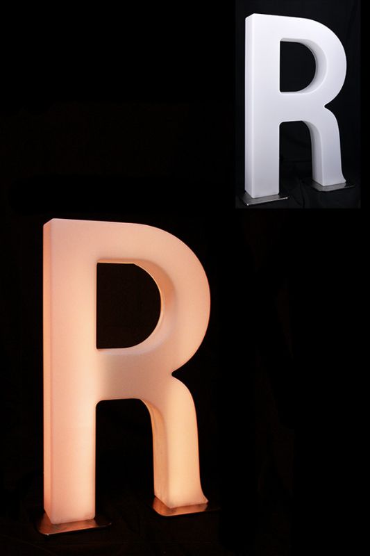 Giant LED Letter R, 82cm tall with RGB remote control, 12 colors, and stainless steel base for vibrant decor at events.