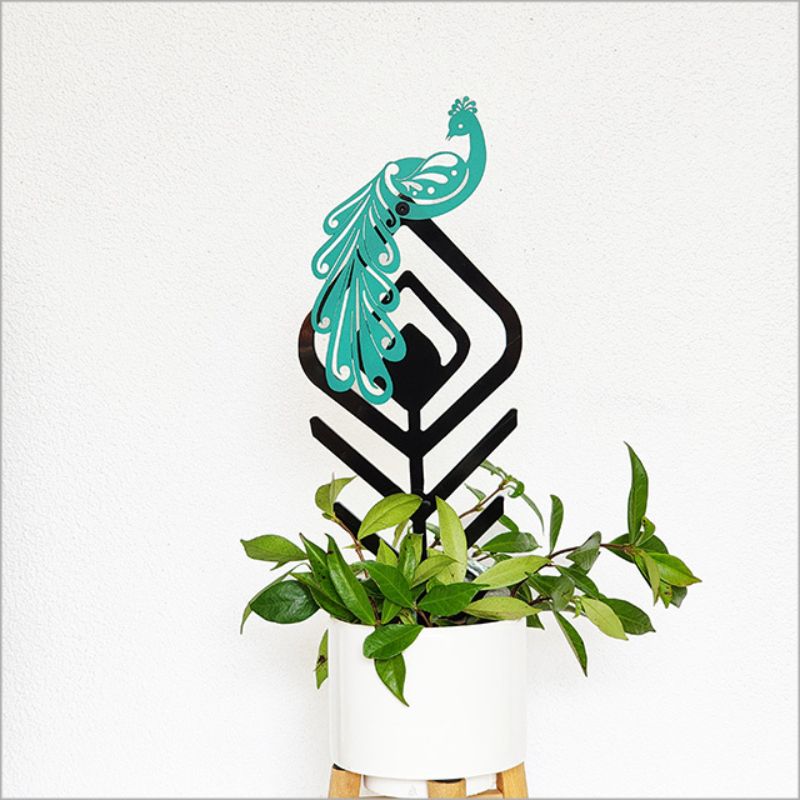 Elegant plant trellis featuring a laser-cut Huia bird design, perfect for supporting vining plants and enhancing decor.