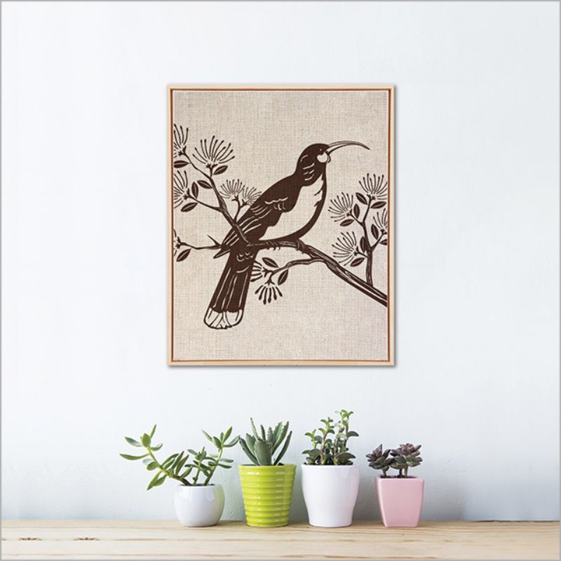 Framed canvas wall art featuring a majestic Huia, perfect for eco-friendly home decor, ready to hang at 52.5cm.