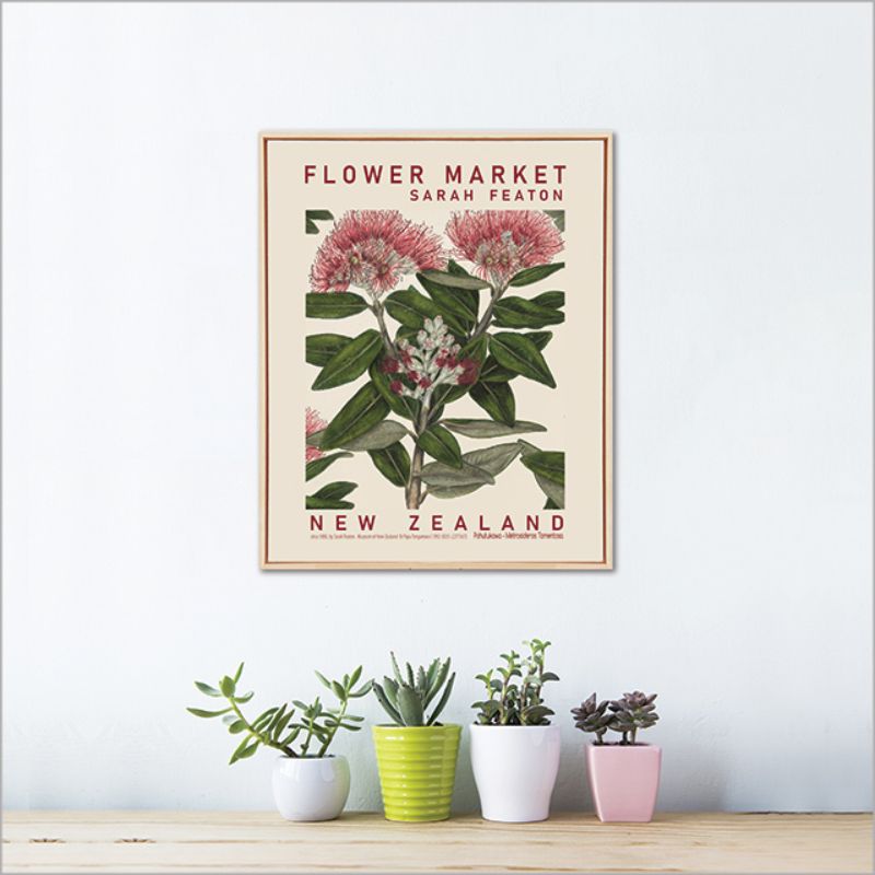 Framed canvas print of Pohutukawa blossoms by Sarah Featon, vibrant red flowers symbolizing New Zealand's natural beauty.