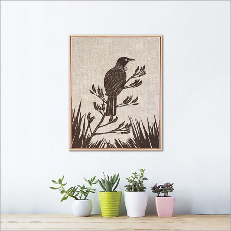 Framed canvas wall art featuring a vibrant Tui on Flax, measuring 52.5cm, perfect for nature-inspired decor.