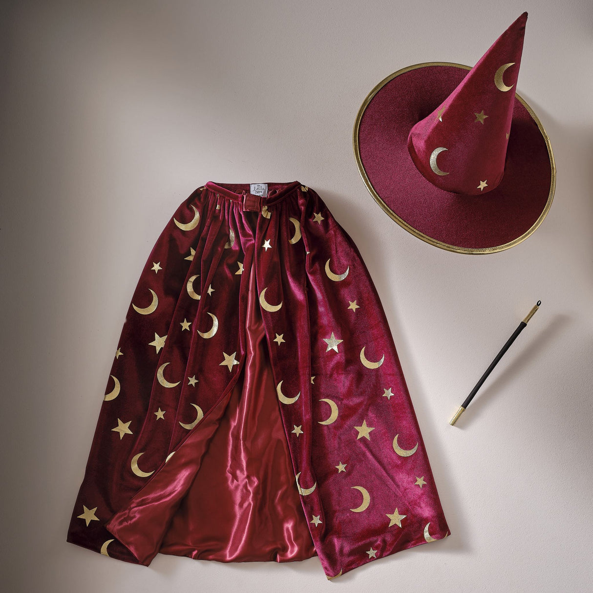 Burgundy velvet magician cape adorned with gold stars and moons, perfect for imaginative play and costume events.