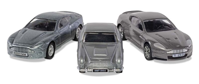 Diecast models of James Bond's iconic Aston Martin cars: DB5, V12 Vanquish, and DBS, featuring exceptional detail and quality.