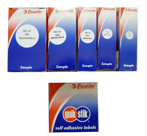 Quik Stik dispenser with removable white dot labels, offering 1400 labels for easy organization.