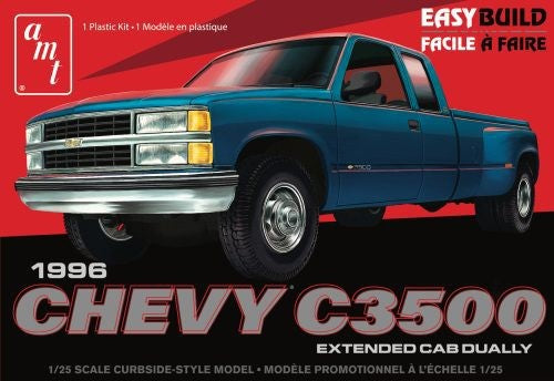 Scale model kit of a 1966 Chevy C-3500 Dually Pickup, featuring detailed parts and customization options for builders.