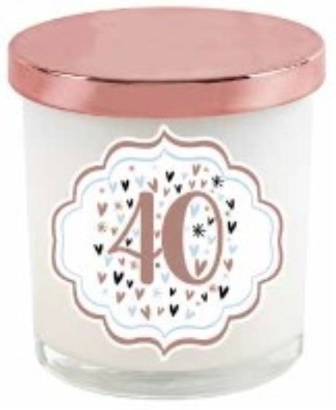 Pastel heart-shaped candle with rose gold lid, perfect for 40th birthday celebrations and elegant home decor.