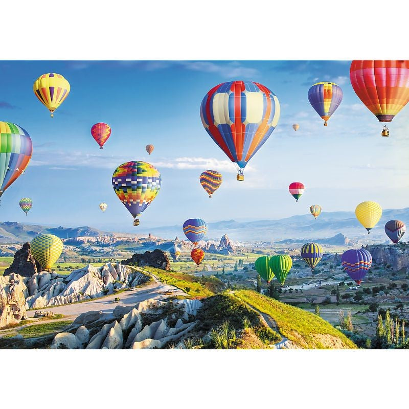 Trefl "1000" puzzle depicting Cappadocia's hot air balloons and rock formations, perfect for family entertainment and cognitive development.