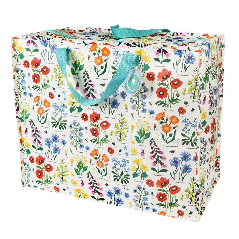 Eco-friendly Wild Flowers Jumbo Storage Bag with zip closure, red handles, and 78-litre capacity for versatile home organization.