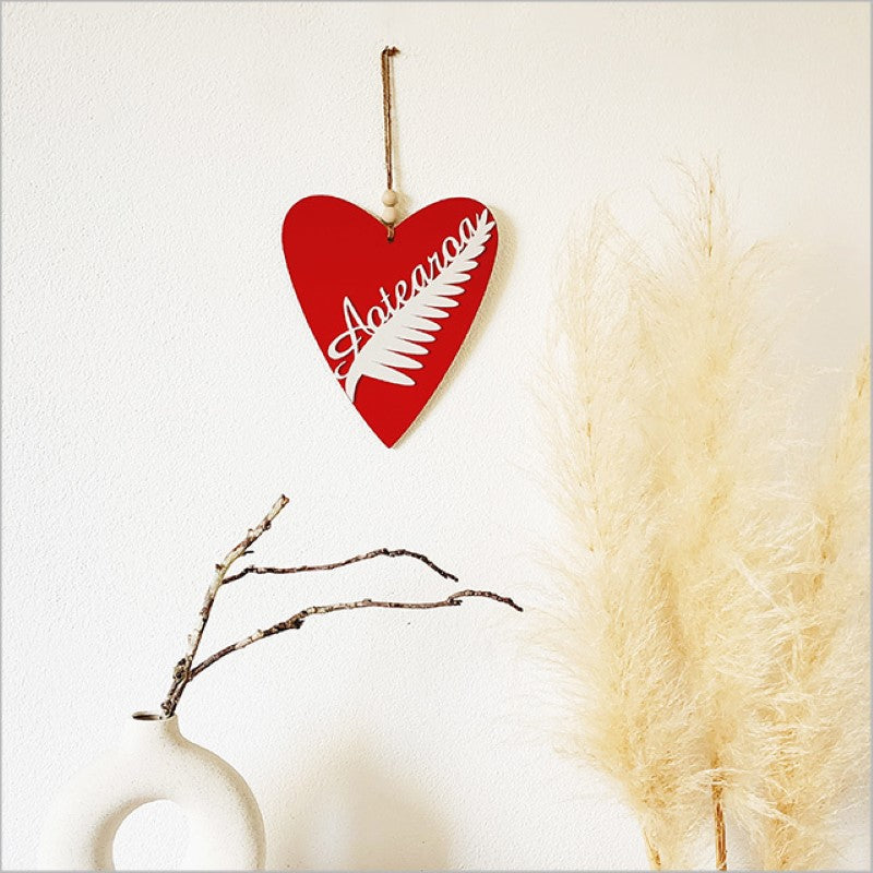 Kiwiana wall art featuring a heart-shaped New Zealand fern in white, perfect for home or office decor.