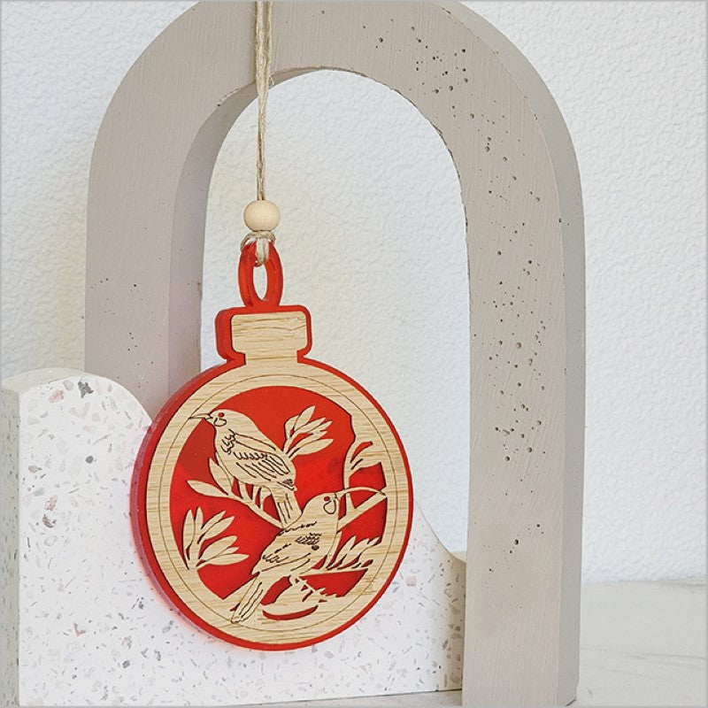 Red satin acrylic hanging ornament featuring a modern design, perfect for enhancing holiday decor and festive gatherings.