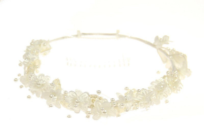 Delicate ivory floral circlet headpiece for brides, enhancing elegance and romance for any wedding theme.
