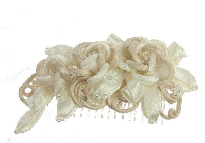 Elegant ivory bridal headpiece with champagne comb, enhancing modern wedding styles with delicate details and comfort.