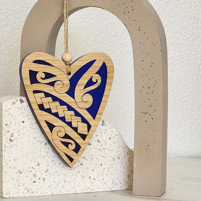 Heart-shaped blue satin acrylic hanging ornament, featuring laser-cut bamboo, perfect for holiday decor and gifting.