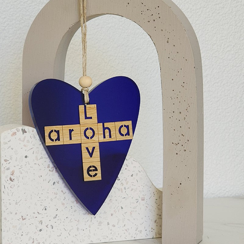 Blue satin acrylic heart ornament featuring Aroha and Love laser cut design, perfect for home decor and gifting.