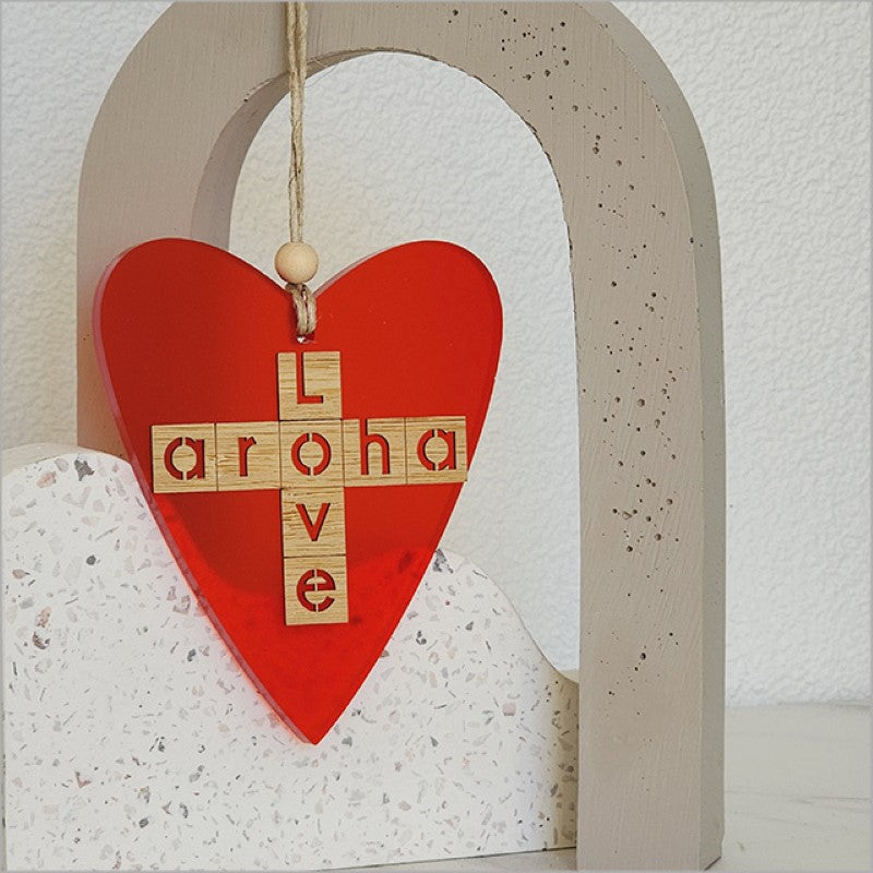 Elegant red satin acrylic heart ornament, laser cut, symbolizing love and Aroha, perfect for home decor or gifting.
