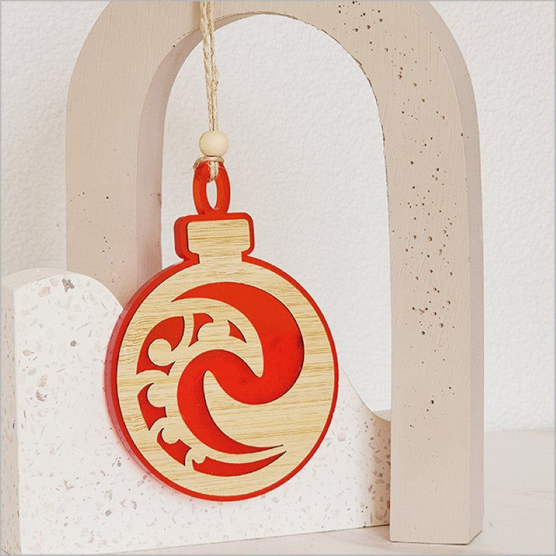 Vibrant red acrylic Koru ornament, laser cut bamboo, perfect for holiday decor or gifts, measuring 80mm x 110mm x 8mm.