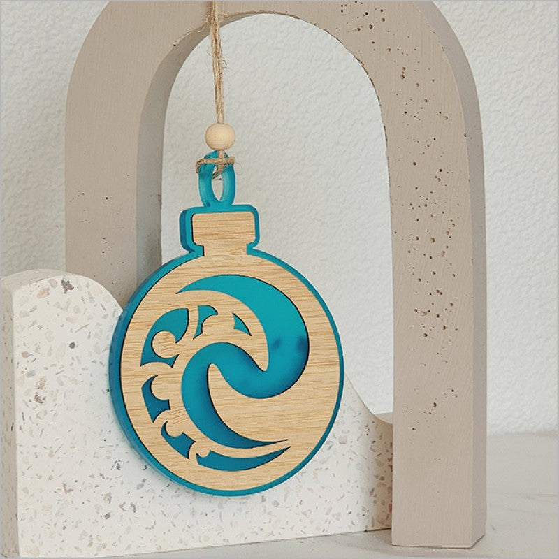 Teal Satin Acrylic Koru hanging ornament showcasing traditional patterns, perfect for decor or gifting.