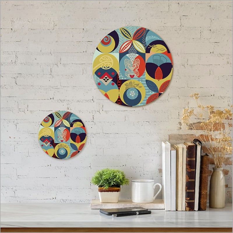 Printed canvas circle featuring Pacific-inspired Kiwiana design, 250mm diameter, ready to hang with a pre-drilled keyhole notch.