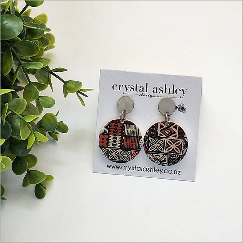 Lightweight drop dangle earrings featuring Paua and Mother of Pearl, handcrafted in unique designs for stylish comfort.