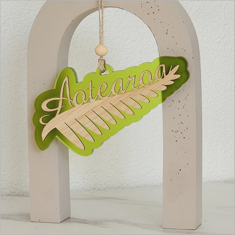 Acrylic Silver Fern ornament in Lime Satin, showcasing New Zealand's heritage with a beautiful laser-cut design.