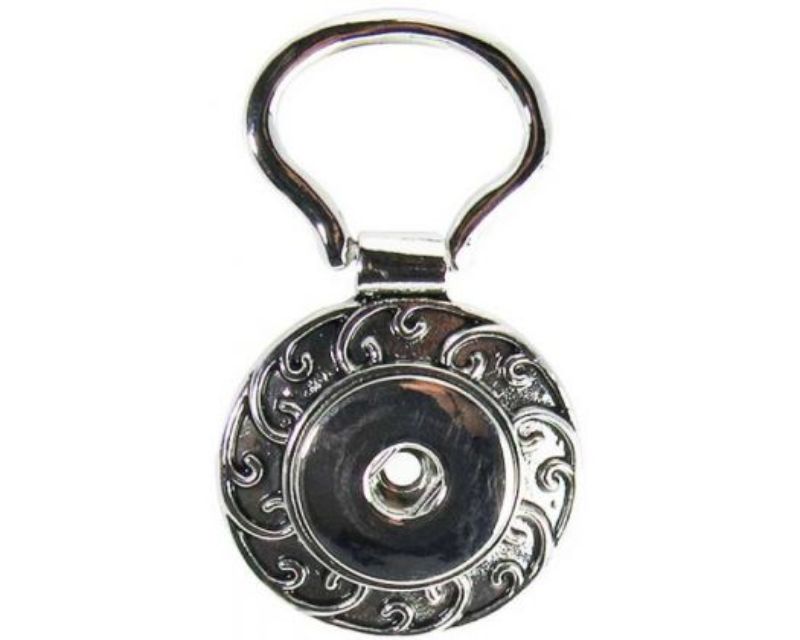 Vibrant Snaps REDFOX Key Ring Koru showcases a stylish Maori spiral design for key organization and personal flair.