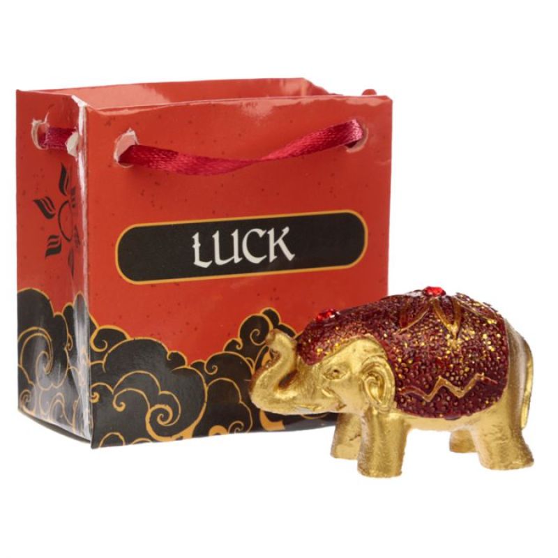 Set of 24 mini gift bags with metallic glitter, each containing a lucky elephant symbolizing prosperity.