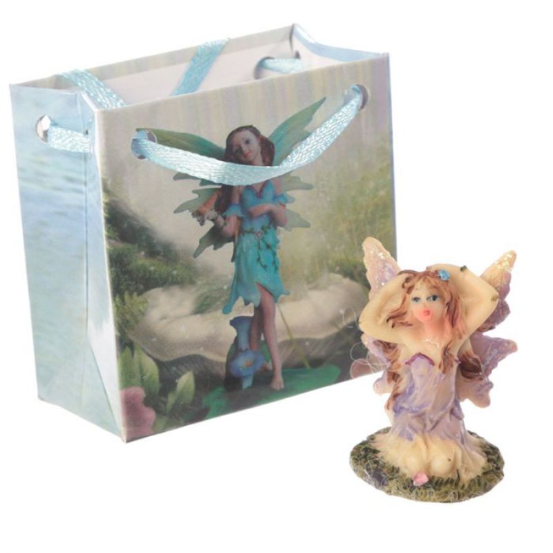 Miniature flower fairies in assorted designs, each in a colorful gift bag, perfect for parties and whimsical decor.