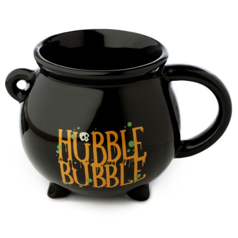 Whimsical black cauldron-shaped ceramic mug, perfect for hot beverages and themed gatherings, enhancing any drinkware collection.