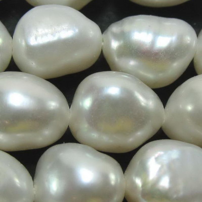 Elegant white pearl beads, 9x7mm, 40.5cm long, set of 3, perfect for jewelry-making and crafting sophisticated designs.