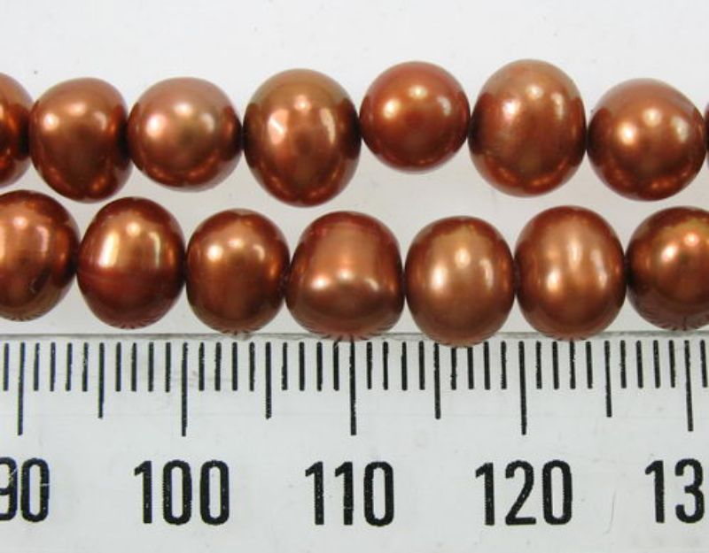 Light brown freshwater pearl beads set of 2, ideal for elegant jewelry designs and crafting projects.