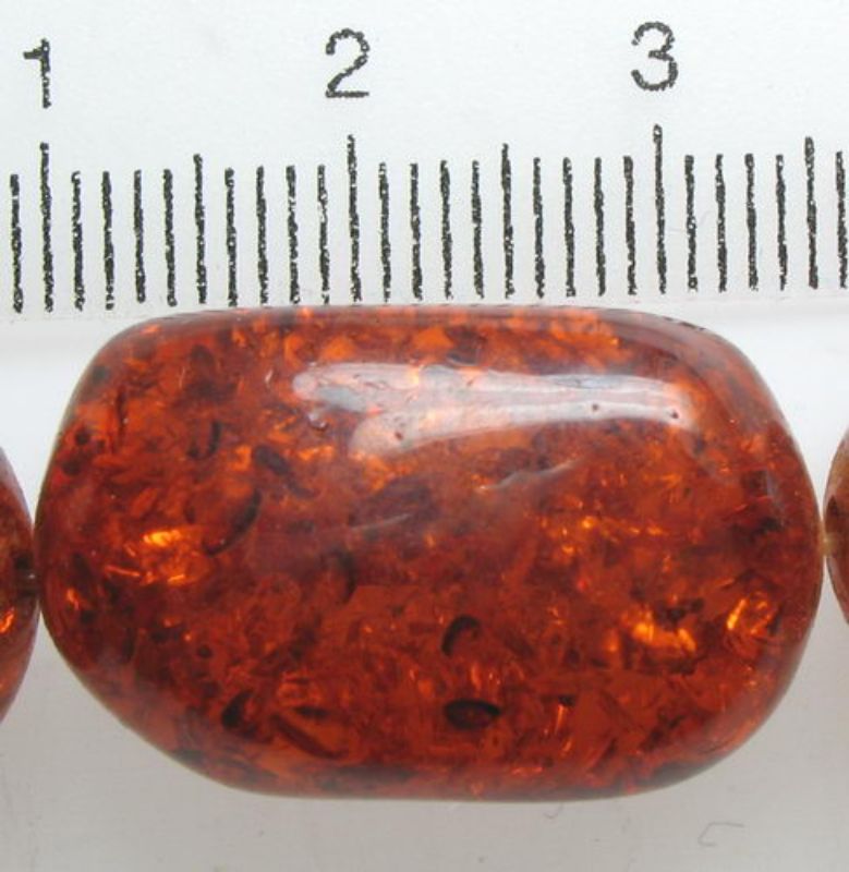 Set of 3 amber resin beads, 23x13mm, featuring warm hues for elegant jewelry-making projects.