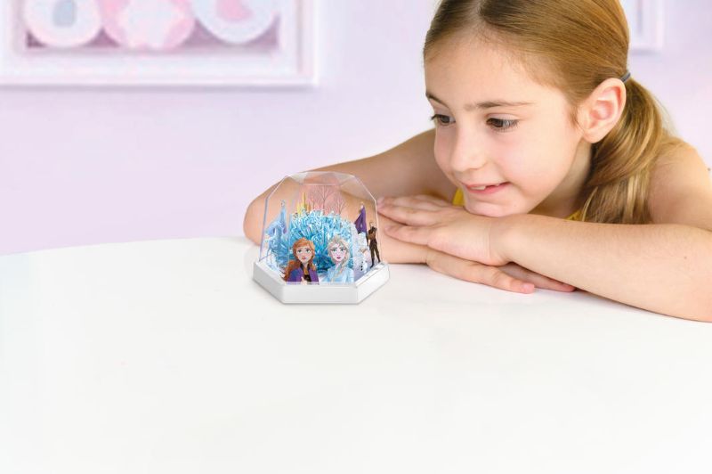 Disney Frozen II Crystal Terrarium Kit by 4M, featuring vibrant container for growing enchanting crystals in a fun, educational experiment.