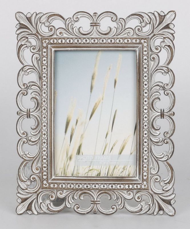 Elegant grey photo frame for 4" x 6" photos, perfect for displaying cherished memories in any decor.