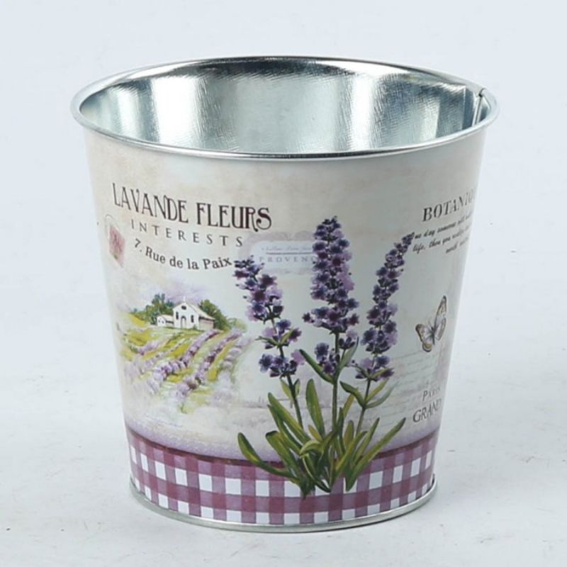 Set of three 11CM metal pot covers featuring a charming lavender floral design, ideal for enhancing plant decor.