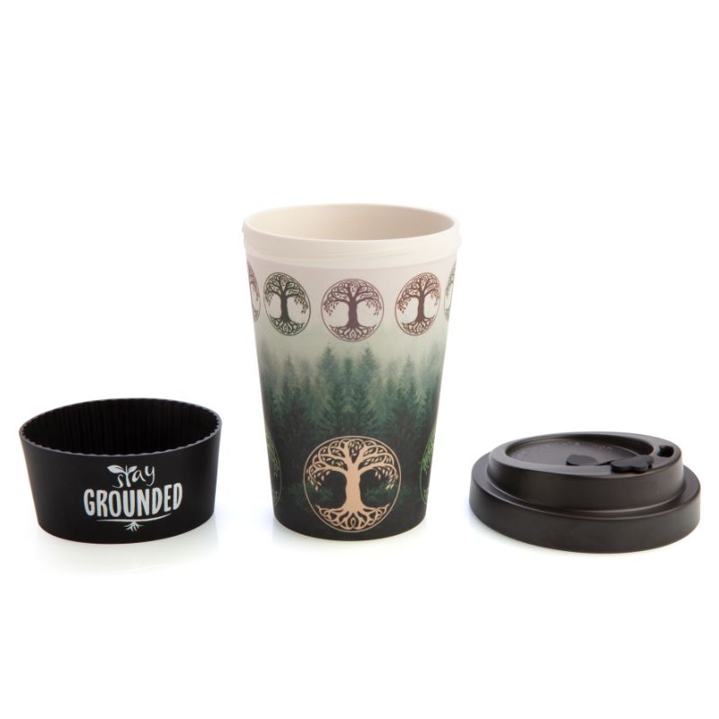 Eco-friendly bamboo travel cup featuring Tree of Life design, 470ml capacity, black anti-spill lid, and 'Stay Grounded' silicone band.