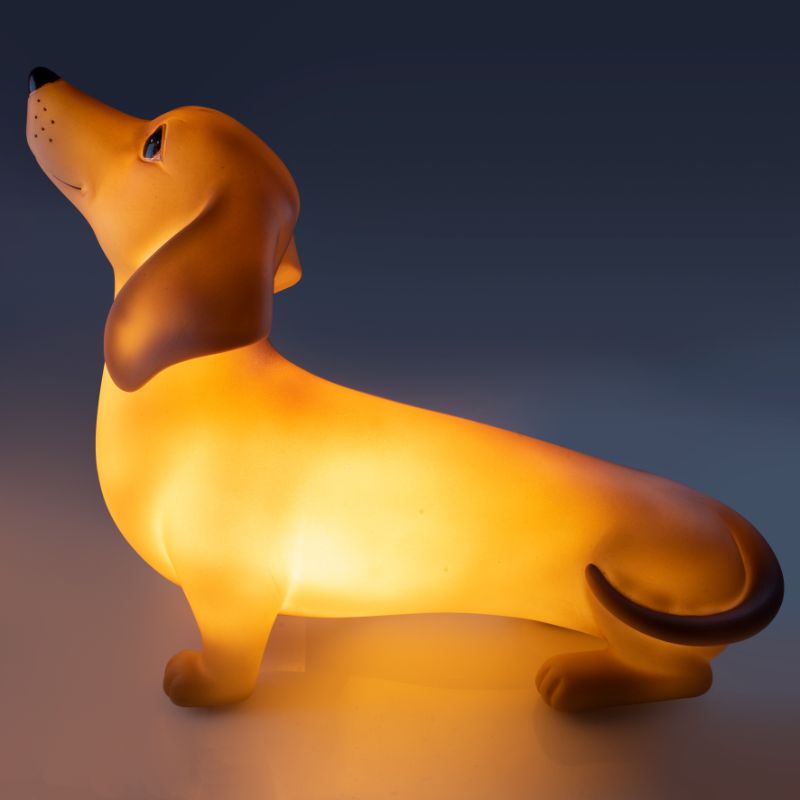 Dachshund-shaped table lamp, 24cm tall, low voltage LED, perfect for kids' rooms, adds whimsy and charm to any decor.