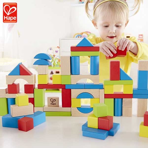 Colorful 100-piece Hape block set featuring various shapes, designed for toddlers to enhance creativity and motor skills.