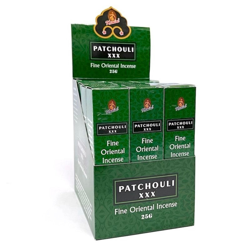 Set of 12 Kamini Patchouli incense packets with 10 handcrafted sticks each, featuring a ceramic burner for calming aromatherapy.