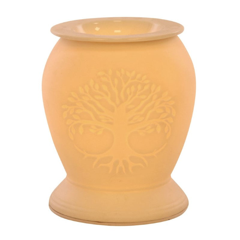 White ceramic electric oil burner featuring a Tree of Life design, emits a warm yellow glow for soothing aromatherapy.