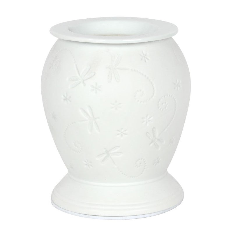 White ceramic electric oil burner with dragonfly design, emits a warm glow while diffusing delightful fragrances.