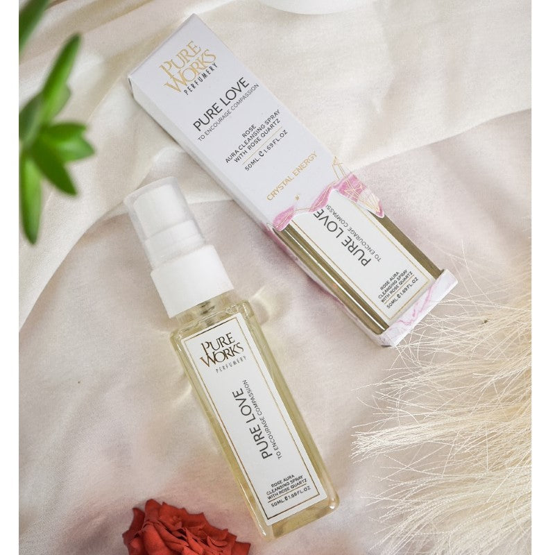 50ml Pure Love Rose Spray in stylish bottle, infused with rose, peony, plum, and Rose Quartz for aura cleansing and emotional healing.