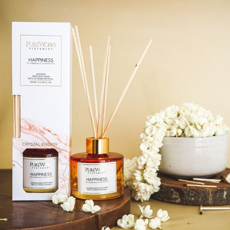 Happiness Jasmine Reed Diffuser in ombre glass with citrine chips, promoting joy and positivity in any space.