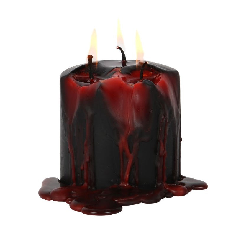 Small Vampire Blood Pillar Candle with bleeding wax effect, perfect for gothic decor and Halloween ambiance.