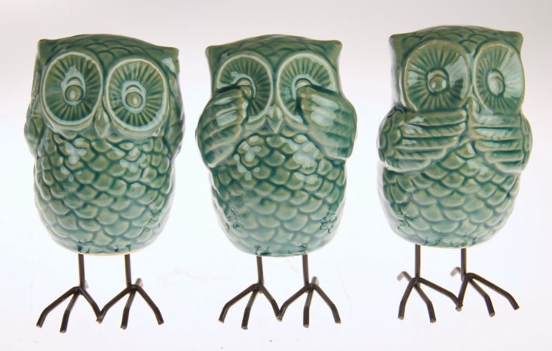 Charming set of 3 ceramic owl ornaments symbolizing wisdom, perfect for home decor and meaningful gifts.