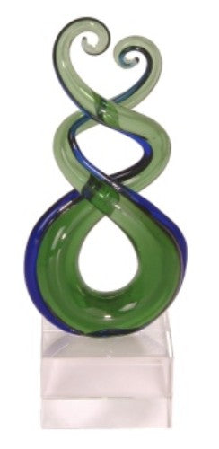 Handcrafted Kiwiana Glass Triple Twist Ornament symbolizing connection, growth, and resilience, vibrant colors and unique design.