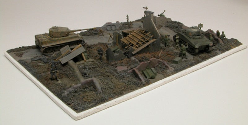 Battlefront Gift Set - D Day Collection features model kits of WWII tanks, infantry, and a diorama base for immersive battle scenes.