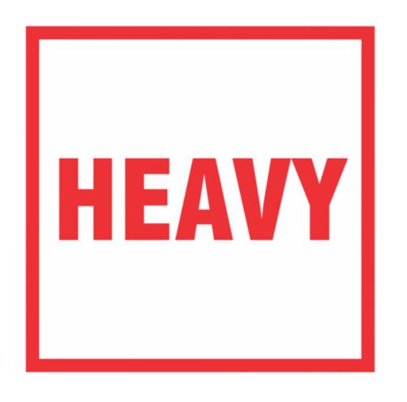 High-quality white/red handling labels for safe shipping, featuring permanent adhesive and bold text, 99mm x 99mm, pack of 500.