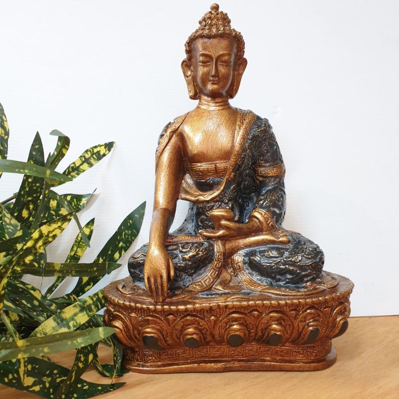 Black Buddha ornament holding a bowl, 25cm, symbolizes tranquility and abundance, perfect for home decor or meditation.