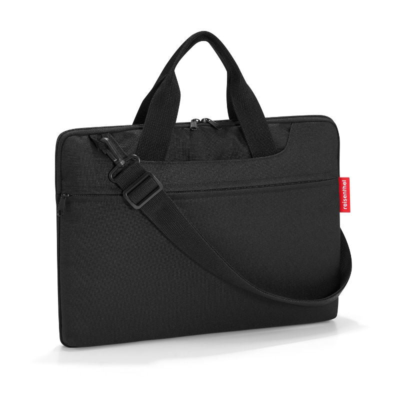 Sleek black Reisenthel netbook bag, padded for 15.6-inch devices, featuring external pockets and adjustable shoulder strap.