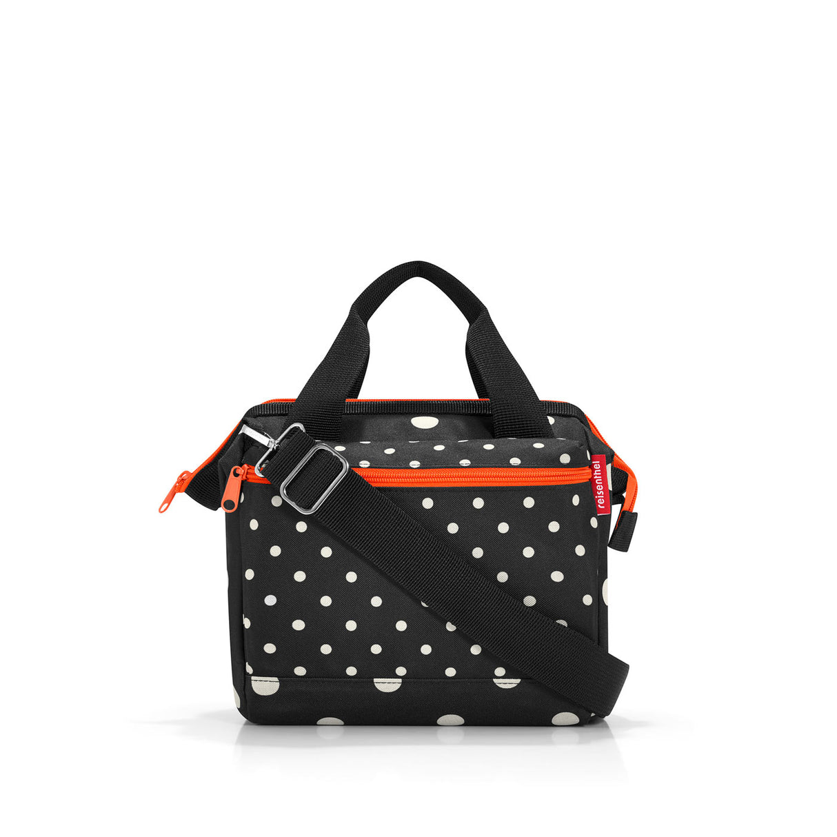 Trendy Reisenthel All Rounder Cross Bag in Mixed Dots, featuring adjustable strap, zip pockets, and spacious design for daily use.